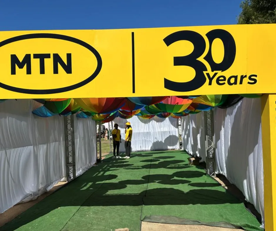 Branded entrance walkway with draped canopy at MTN's 30 Years celebration